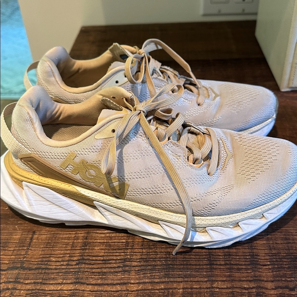 Hoka ONE tan, gold and white. Gently used.